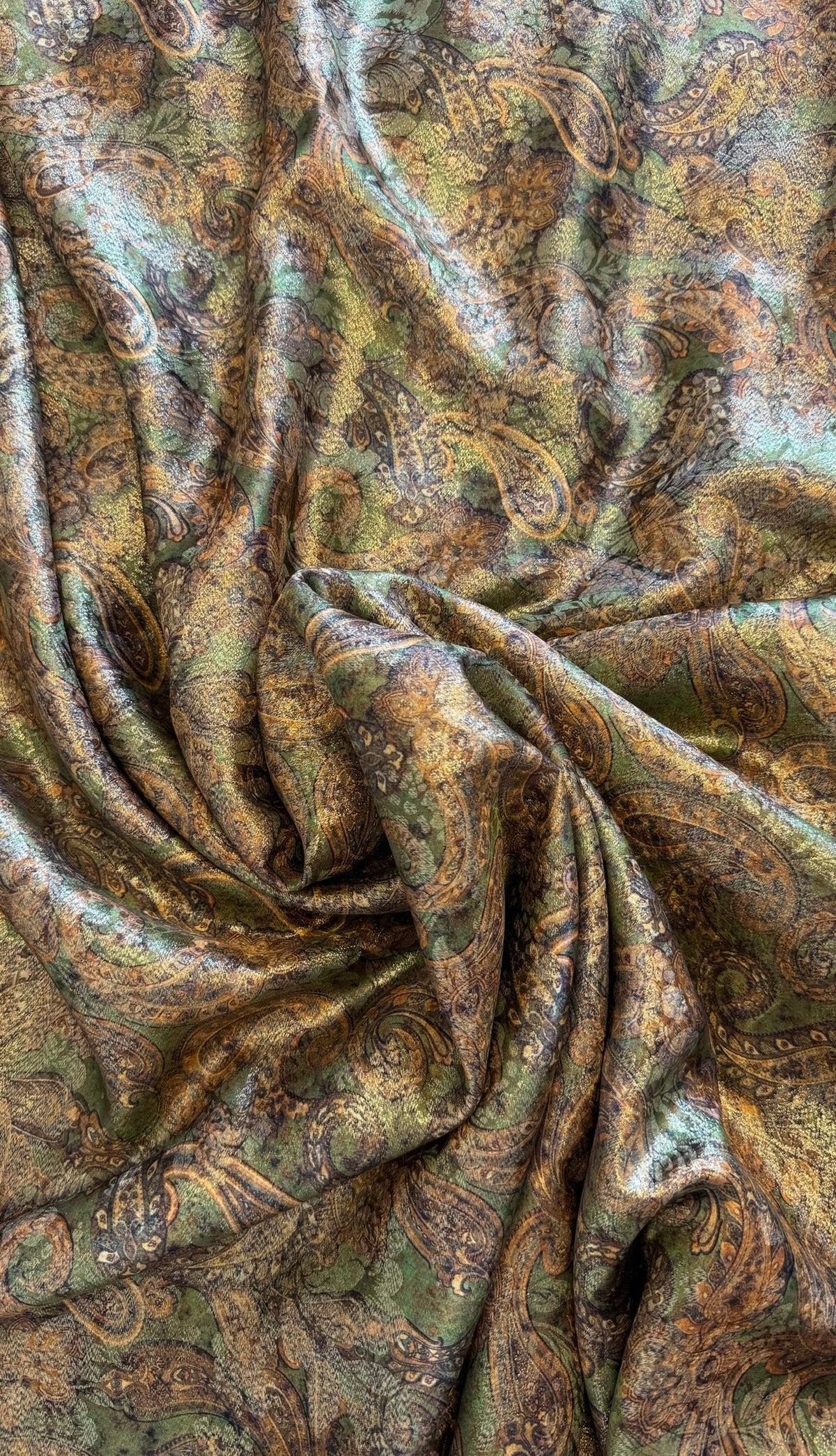 A piece of green gold-embroidered silk
